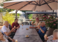 Déjeuner en terrasse à la Résidence Les Portes de Champagne : un moment convivial sous le soleil Les Portes de Champagne Chézy-sur-Marne